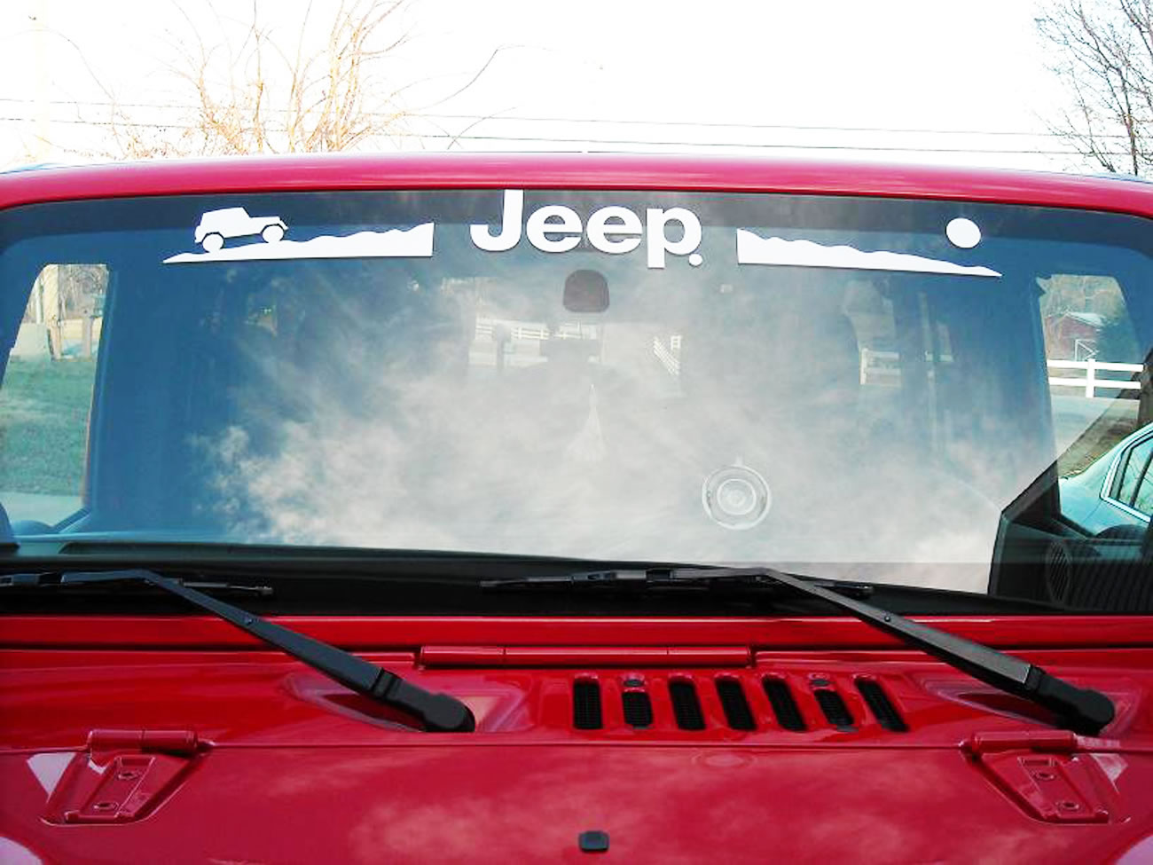 Putting stickers on sales car rear window